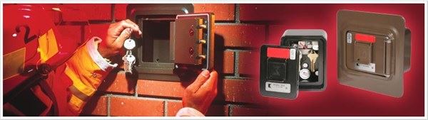 Firefighter putting keys into the Knox Box